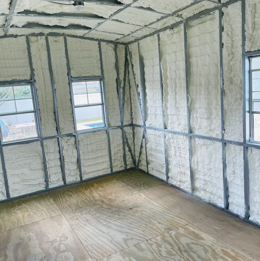 Closed-cell spray foam insulation applied to wall cavities in a residential project in Pullman